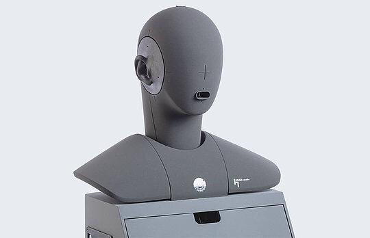Front view of artificial head HMS-II.3 with torso